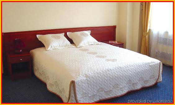 Sun Light Hotel Charkiw Zimmer foto